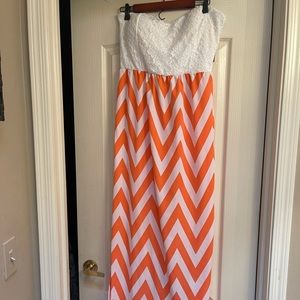 Never worn coral and white chevron maxi dress.